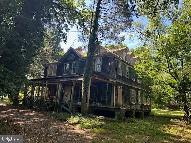 605 Upland Road Pikesville, MD 21208 - Photo 2 of 38 front view of house with a yard