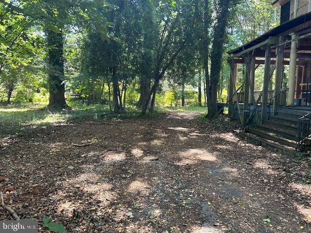 605 Upland Road Pikesville, MD 21208 - Photo 31 of 38 a view of a house with yard and tree s