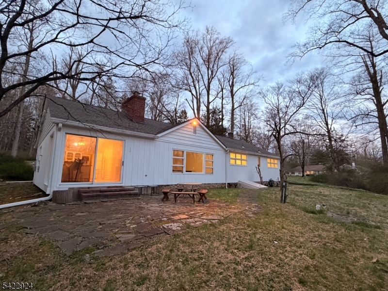 62 Gaston Road, Unit 62 Morristown, NJ 07960 - Photo 11 of 42 a front view of house with yard and trees in the background