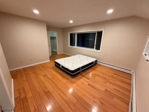 a view of hallway with walk in closet