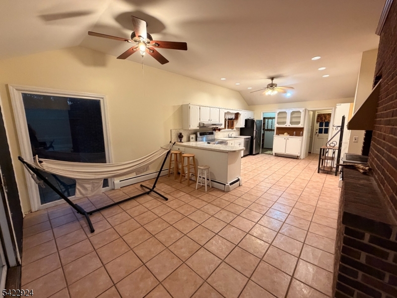 62 Gaston Road, Unit 62 Morristown, NJ 07960 - Photo 28 of 42 a living room with furniture and a flat screen tv
