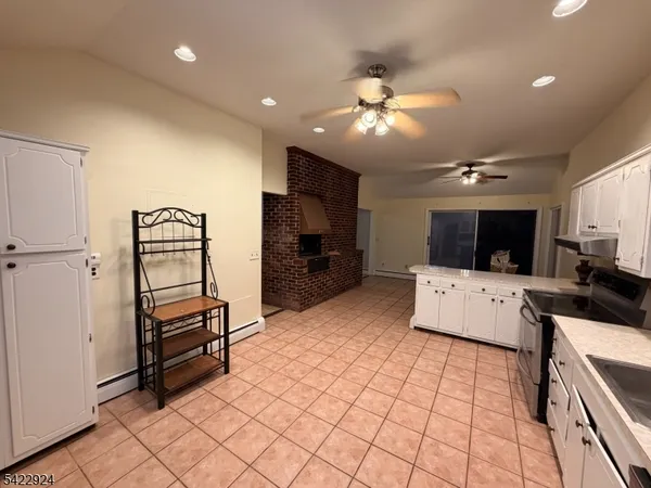 a view of dinning room with furniture and wooden floor