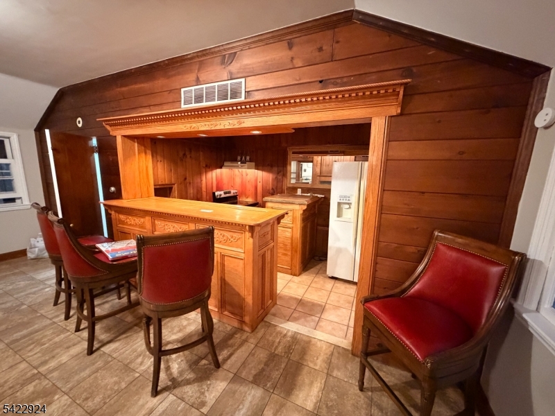 62 Gaston Road, Unit 62 Morristown, NJ 07960 - Photo 31 of 42 a view of living room with furniture and a refrigerator