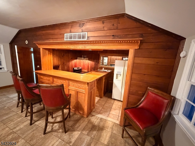 62 Gaston Road, Unit 62 Morristown, NJ 07960 - Photo 32 of 42 a view of dinning room with furniture and wooden floor