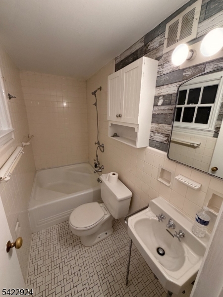 62 Gaston Road, Unit 62 Morristown, NJ 07960 - Photo 39 of 42 a bathroom with a sink a toilet and shower