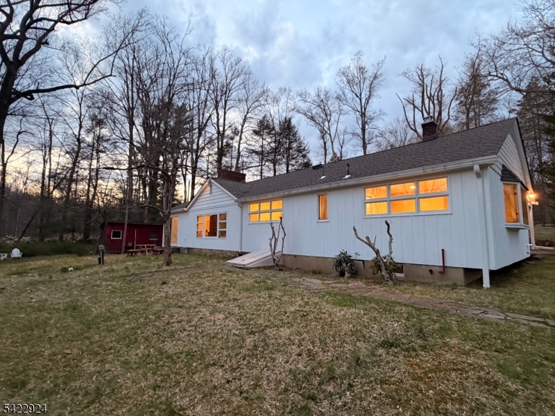 62 Gaston Road, Unit 62 Morristown, NJ 07960 - Photo 9 of 42 a backyard of a house with shaded area