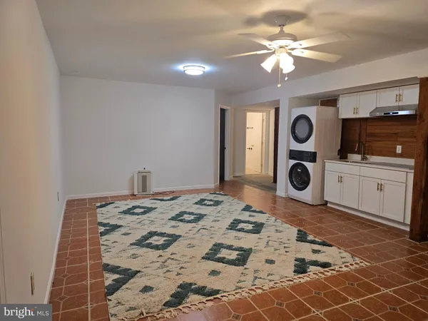 a bedroom with a bed and a cabinets
