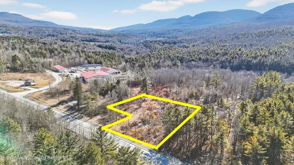 a view of a pool with a yard