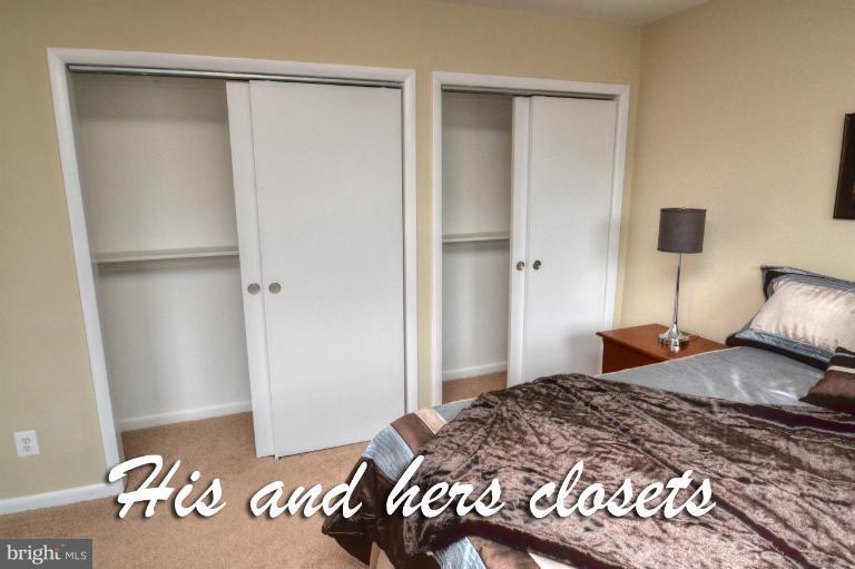 1302 Gransay Road Rosedale, MD 21237 - Photo 19 of 30 a bedroom with a bed and a table in it
