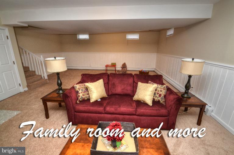1302 Gransay Road Rosedale, MD 21237 - Photo 20 of 30 a living room with furniture rug and lamp