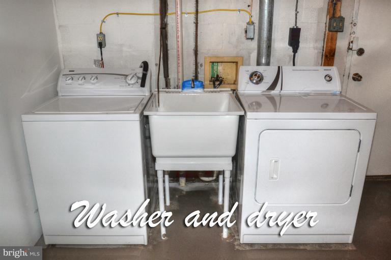 1302 Gransay Road Rosedale, MD 21237 - Photo 21 of 30 a view of washer and dryer with a sink