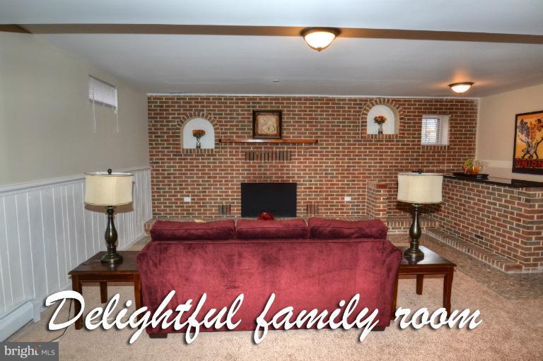 1302 Gransay Road Rosedale, MD 21237 - Photo 5 of 30 a front view of a house with a fireplace