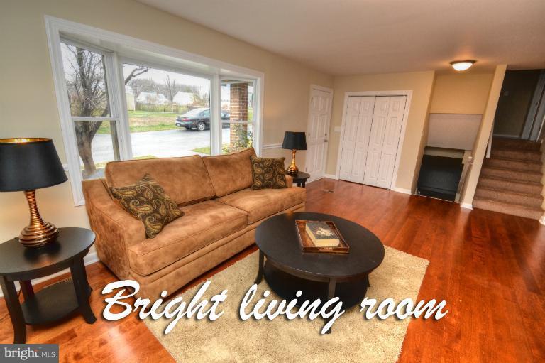 1302 Gransay Road Rosedale, MD 21237 - Photo 6 of 30 a living room with furniture and a wooden floor
