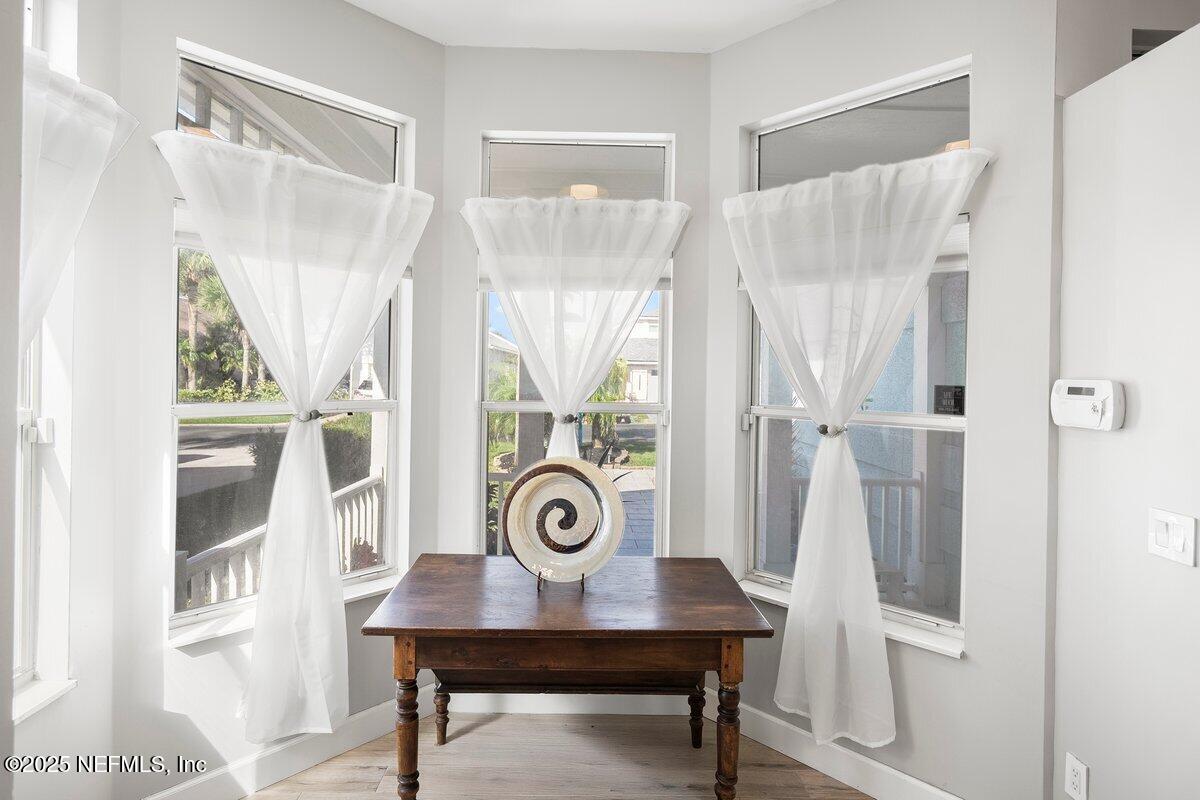 204 Joey Drive St. Augustine, FL 32080 - Photo 7 of 35 a view of a bedroom with a table and chairs