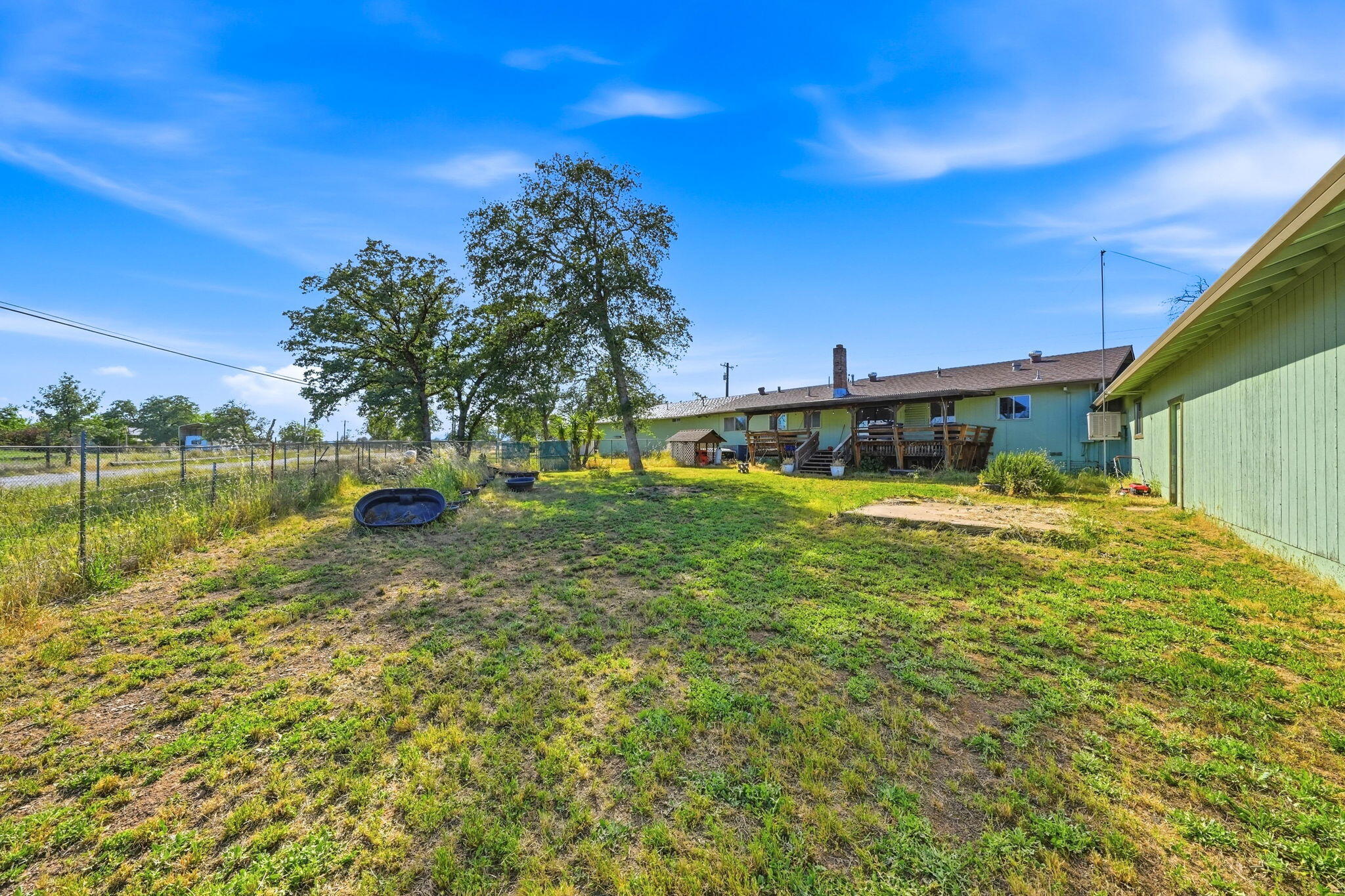 22189 Old Alturas Road Redding, CA 96003 - Photo 41 of 70 a view of a house with a yard