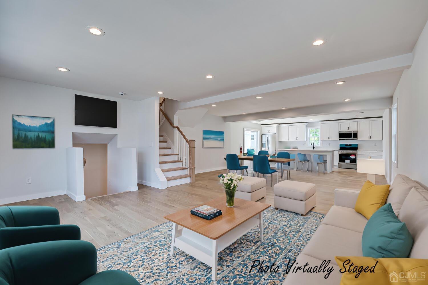 21 Brian Road Edison, NJ 08817 - Photo 12 of 47 a living room with furniture and a wooden floor