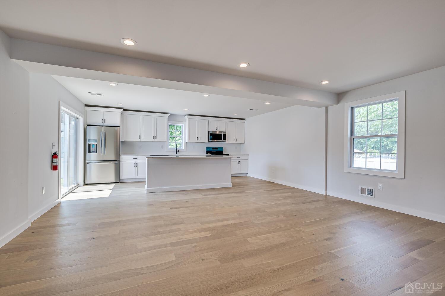 21 Brian Road Edison, NJ 08817 - Photo 16 of 47 a view of a kitchen with refrigerator and window