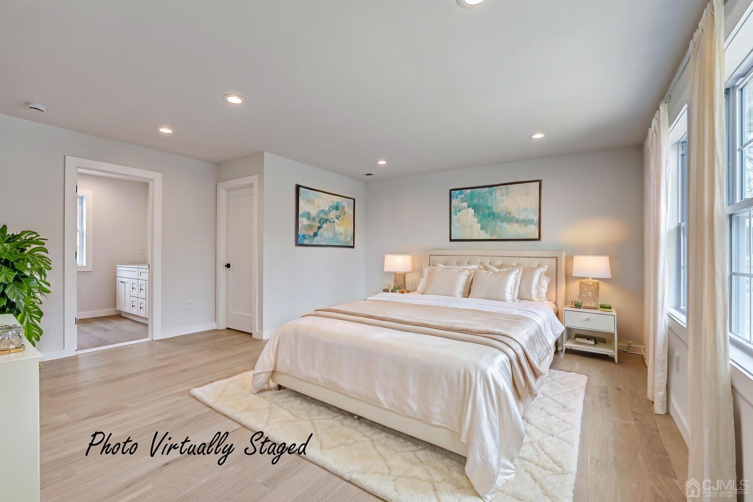 21 Brian Road Edison, NJ 08817 - Photo 25 of 47 a bedroom with a large bed and a potted plant