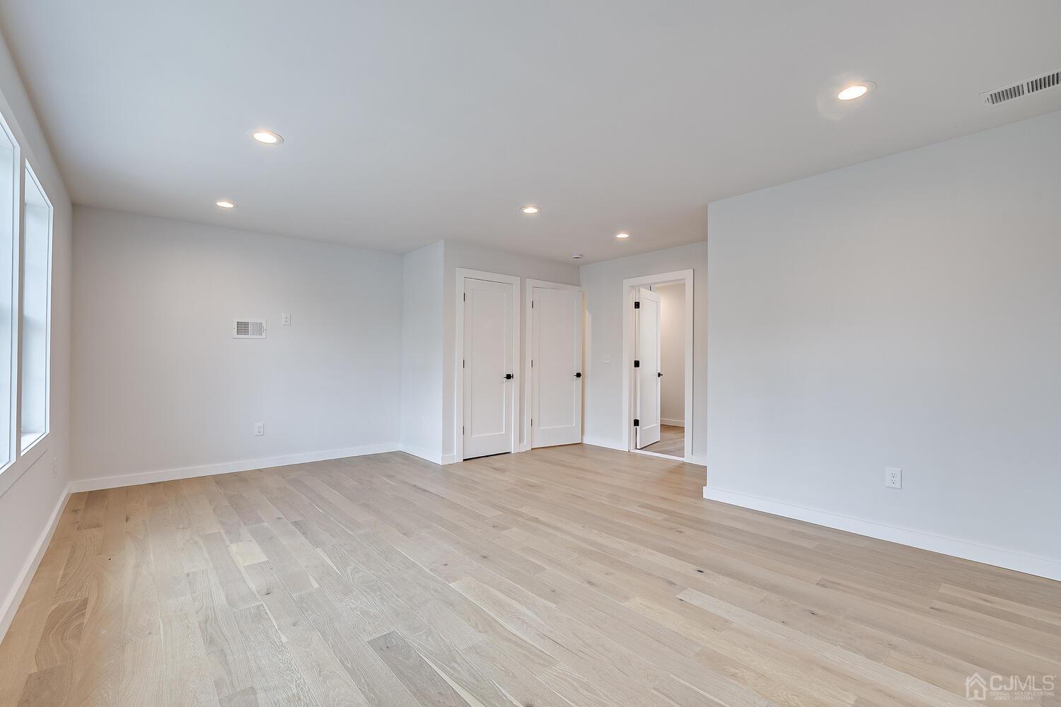 21 Brian Road Edison, NJ 08817 - Photo 26 of 47 a view of an empty room with wooden floor