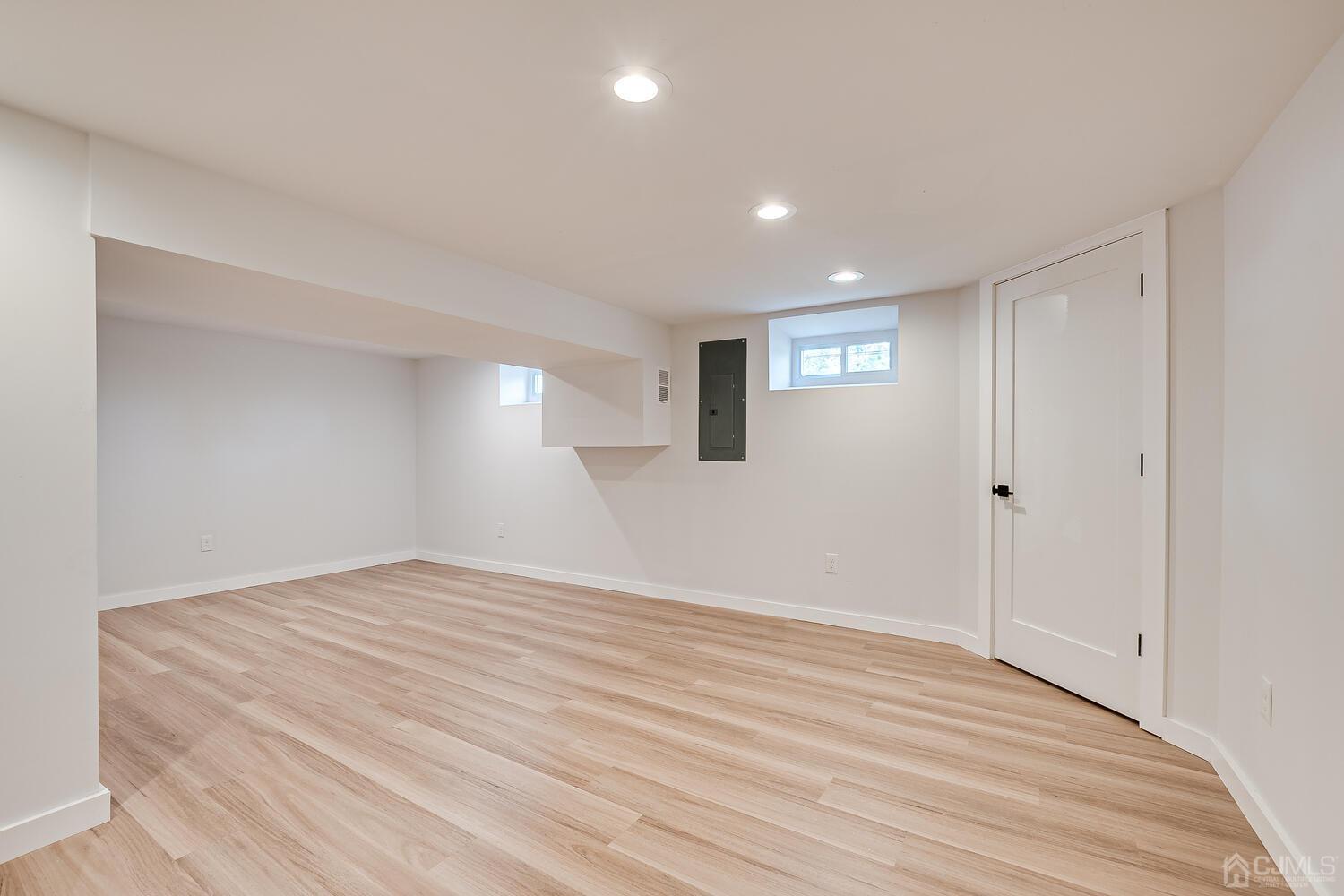21 Brian Road Edison, NJ 08817 - Photo 44 of 47 a view of empty room with wooden floor