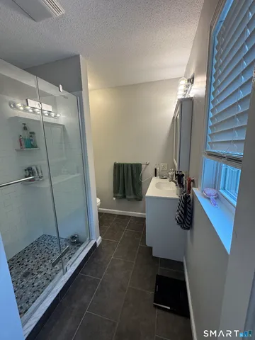 a bathroom with a sink and mirror