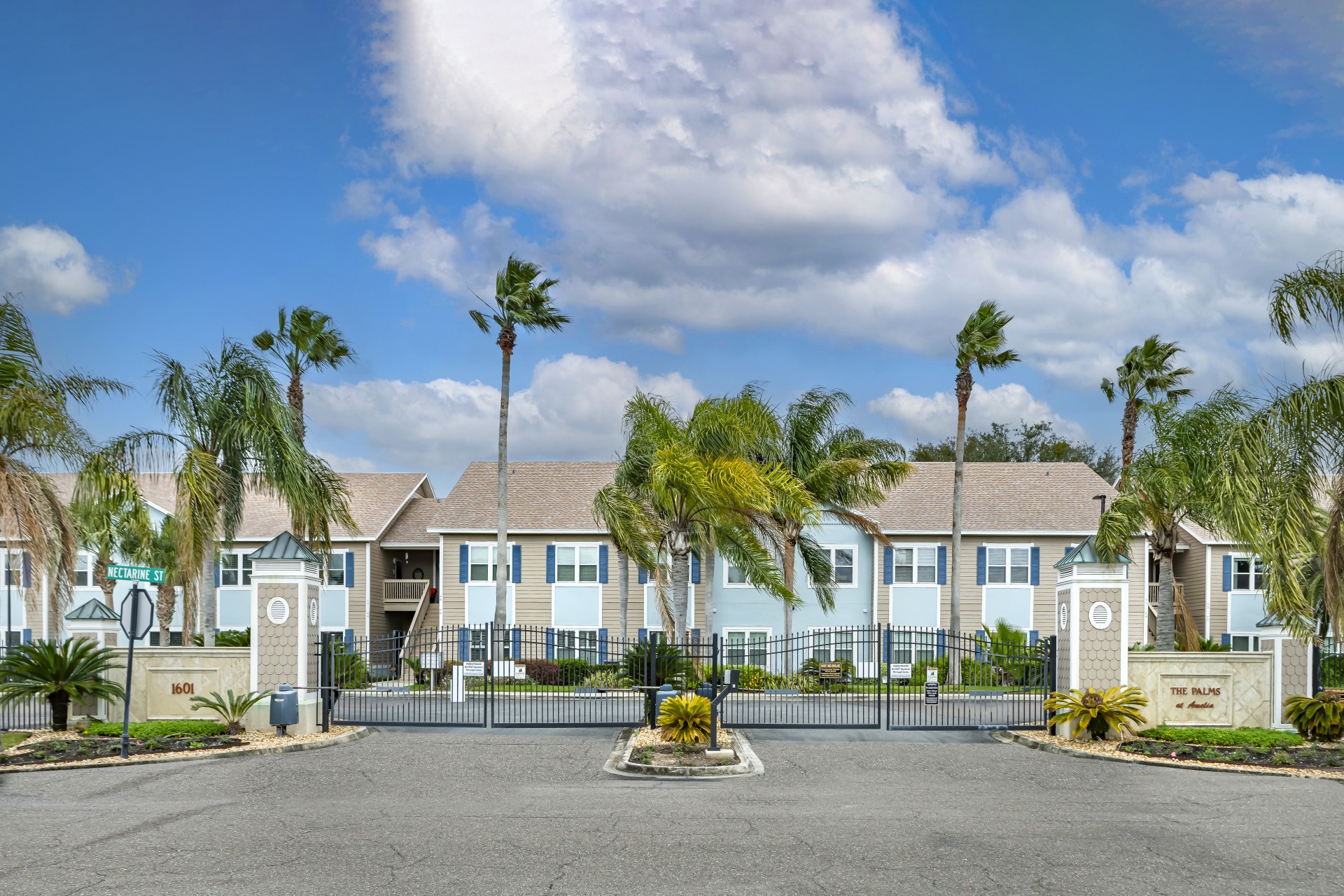 a view of multiple houses with a street