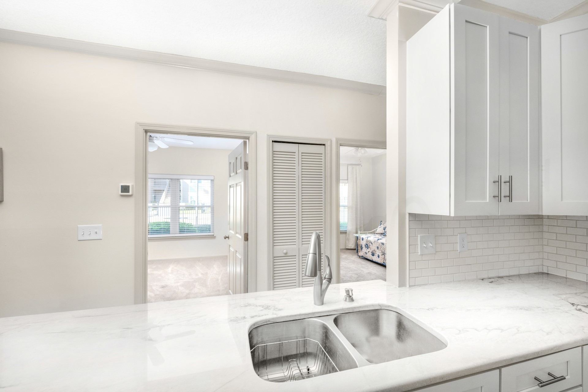 1601 Nectarine Street, Unit B2 Fernandina Beach, FL 32034 - Photo 14 of 46 a kitchen with a sink and cabinets