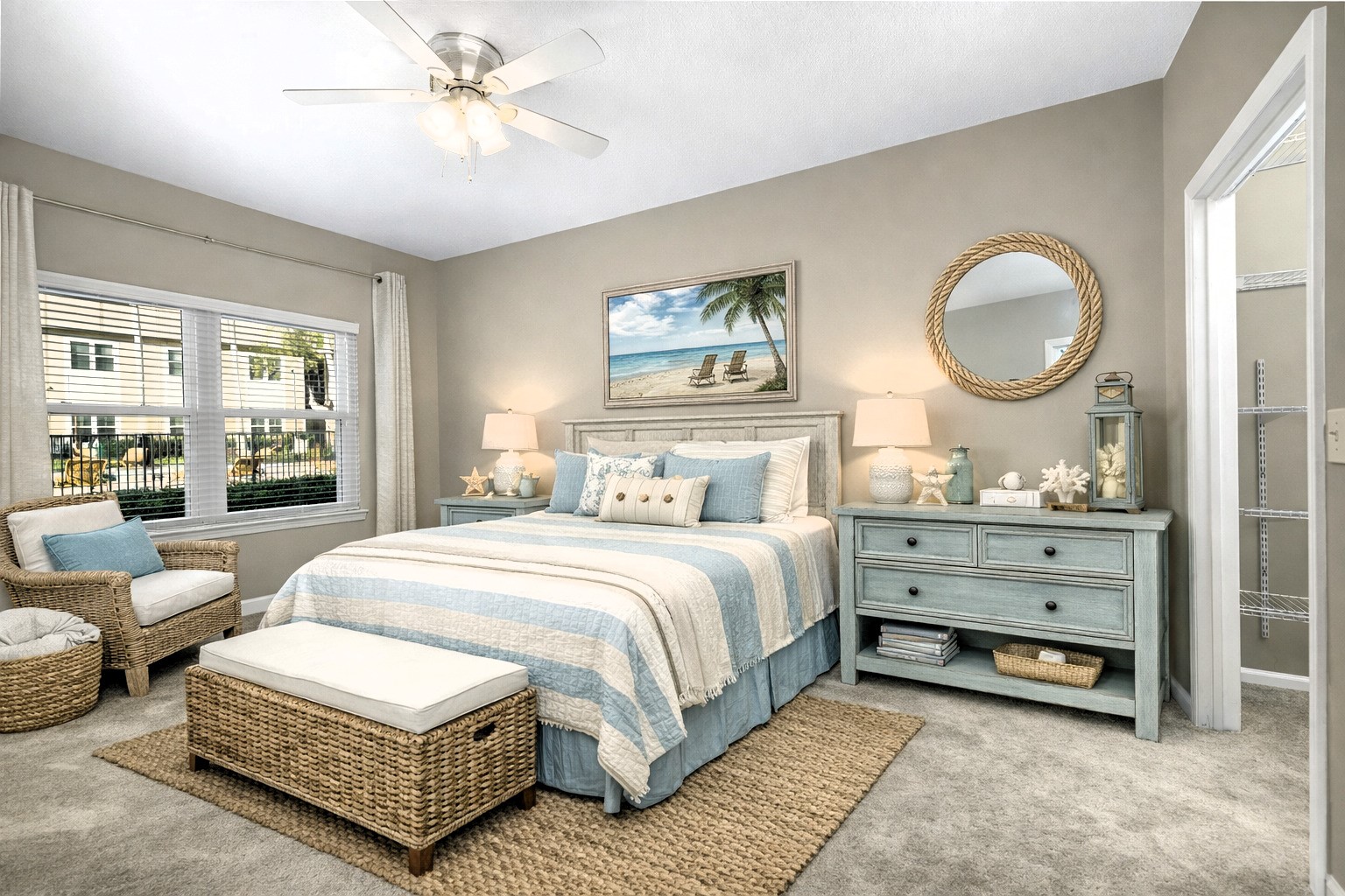 1601 Nectarine Street, Unit B2 Fernandina Beach, FL 32034 - Photo 23 of 46 a spacious bedroom with a bed a mirror and a large window