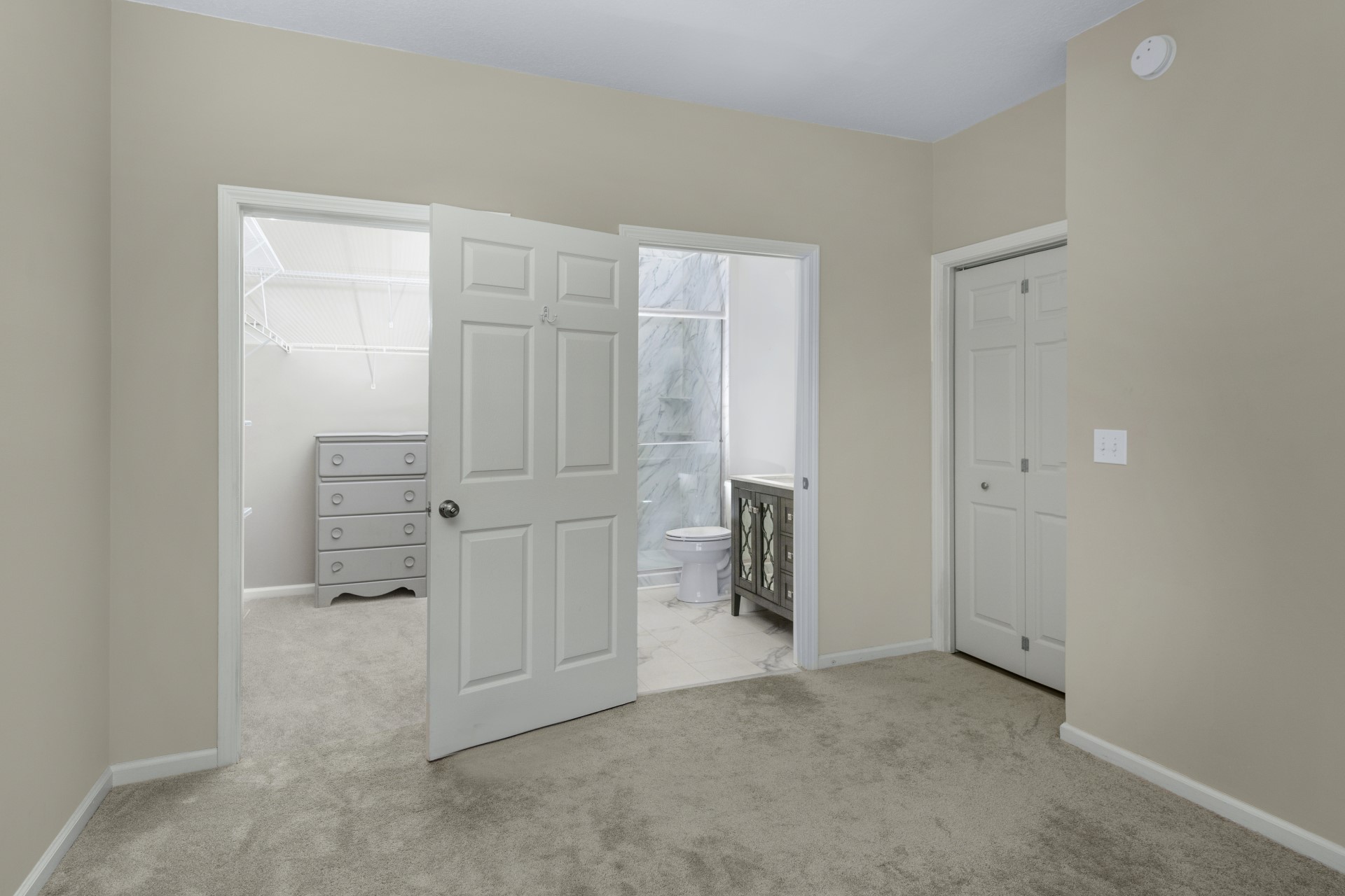 1601 Nectarine Street, Unit B2 Fernandina Beach, FL 32034 - Photo 24 of 46 an empty room with cabinet and mirrors