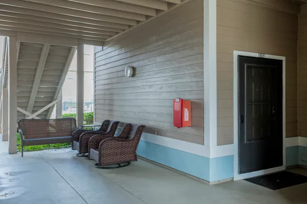 a building outdoor space with patio furniture