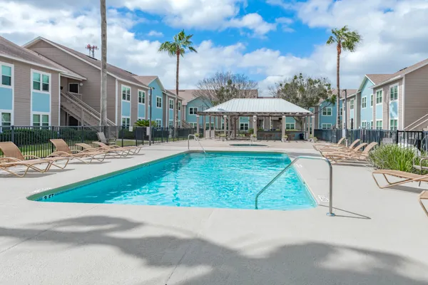 a view of a house with a swimming pool