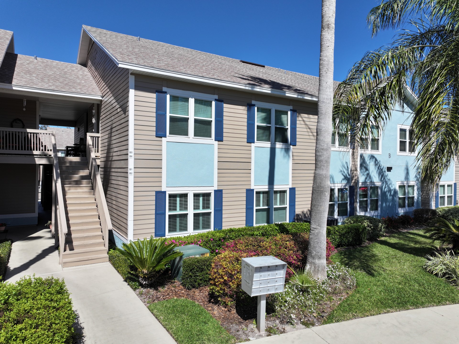 1601 Nectarine Street, Unit B2 Fernandina Beach, FL 32034 - Photo 35 of 46 a front view of a house with a yard