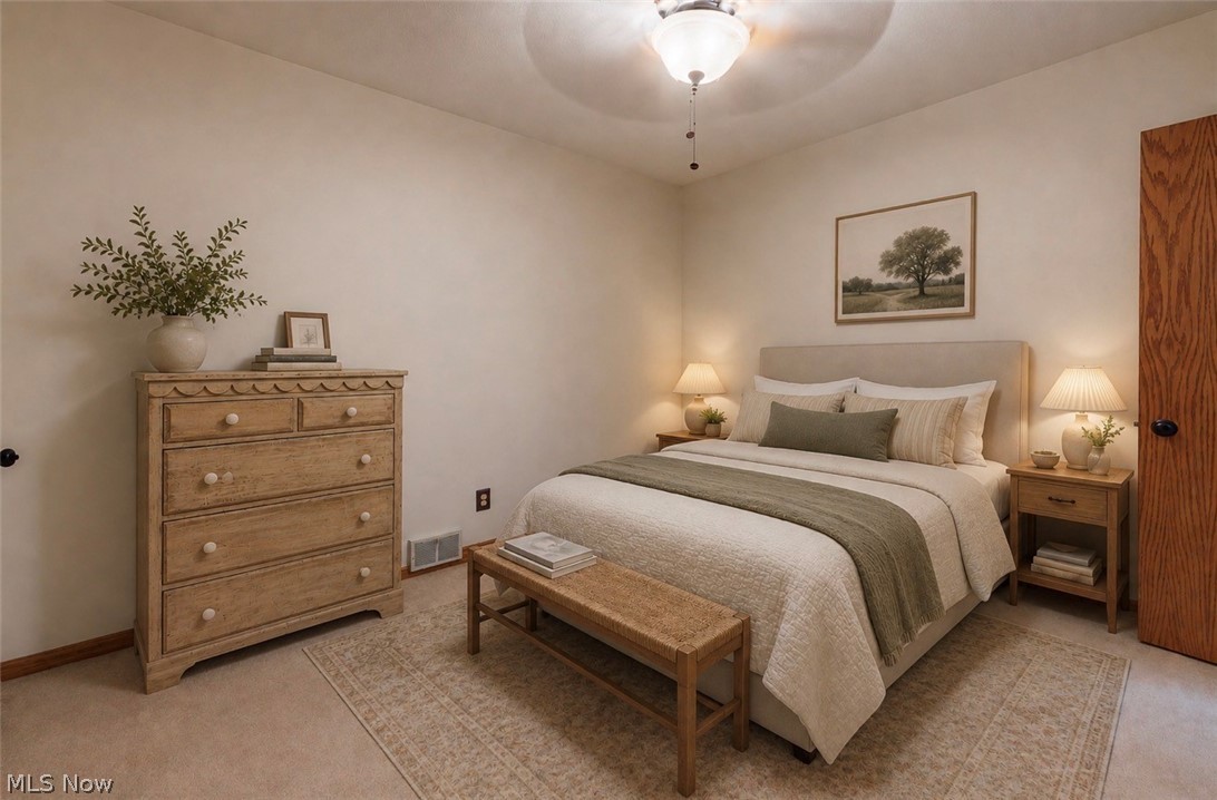 86532 North Bay Road Scio, OH 43988 - Photo 37 of 48 Neutral-toned bedroom featuring wall-to-wall carpeting and a ceiling fan with integrated lighting