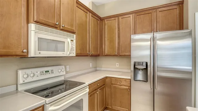 a view of an empty room with closet area