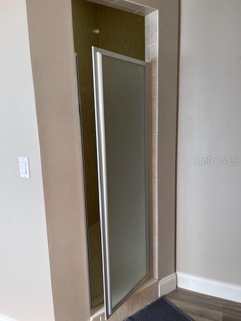 4493 Southwest 102nd Lane Road Ocala, FL 34476 - Photo 24 of 63 a view of a hallway with wooden floor