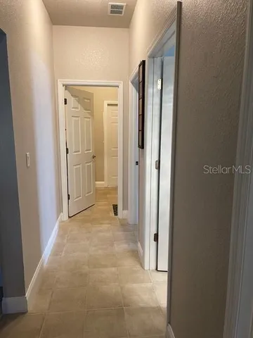 a bathroom with a granite countertop toilet sink and shower