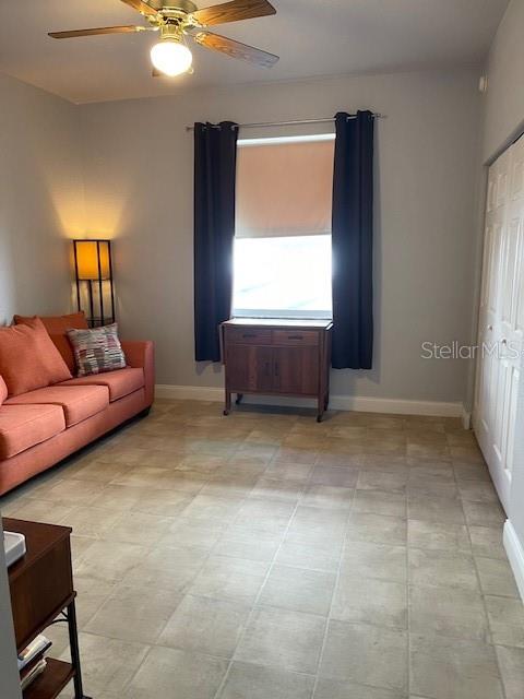 4493 Southwest 102nd Lane Road Ocala, FL 34476 - Photo 39 of 63 a living room with furniture and a window