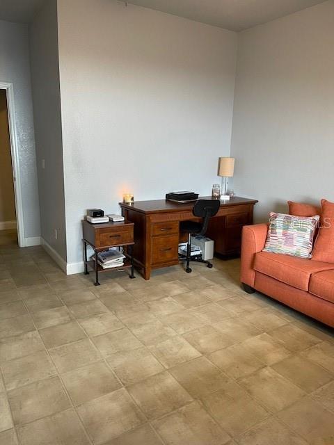 4493 Southwest 102nd Lane Road Ocala, FL 34476 - Photo 40 of 63 a reading room with furniture and a piano