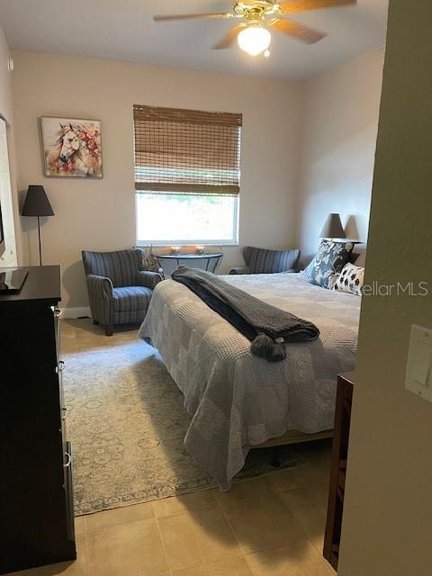 4493 Southwest 102nd Lane Road Ocala, FL 34476 - Photo 45 of 63 a bedroom with a bed and a couch