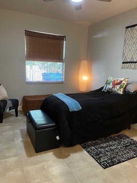 4493 Southwest 102nd Lane Road Ocala, FL 34476 - Photo 47 of 63 a living room with furniture rug and window