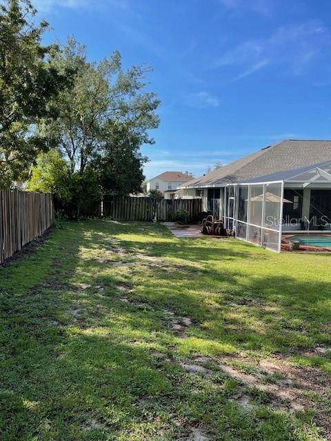 4493 Southwest 102nd Lane Road Ocala, FL 34476 - Photo 58 of 63 a view of a house with a yard