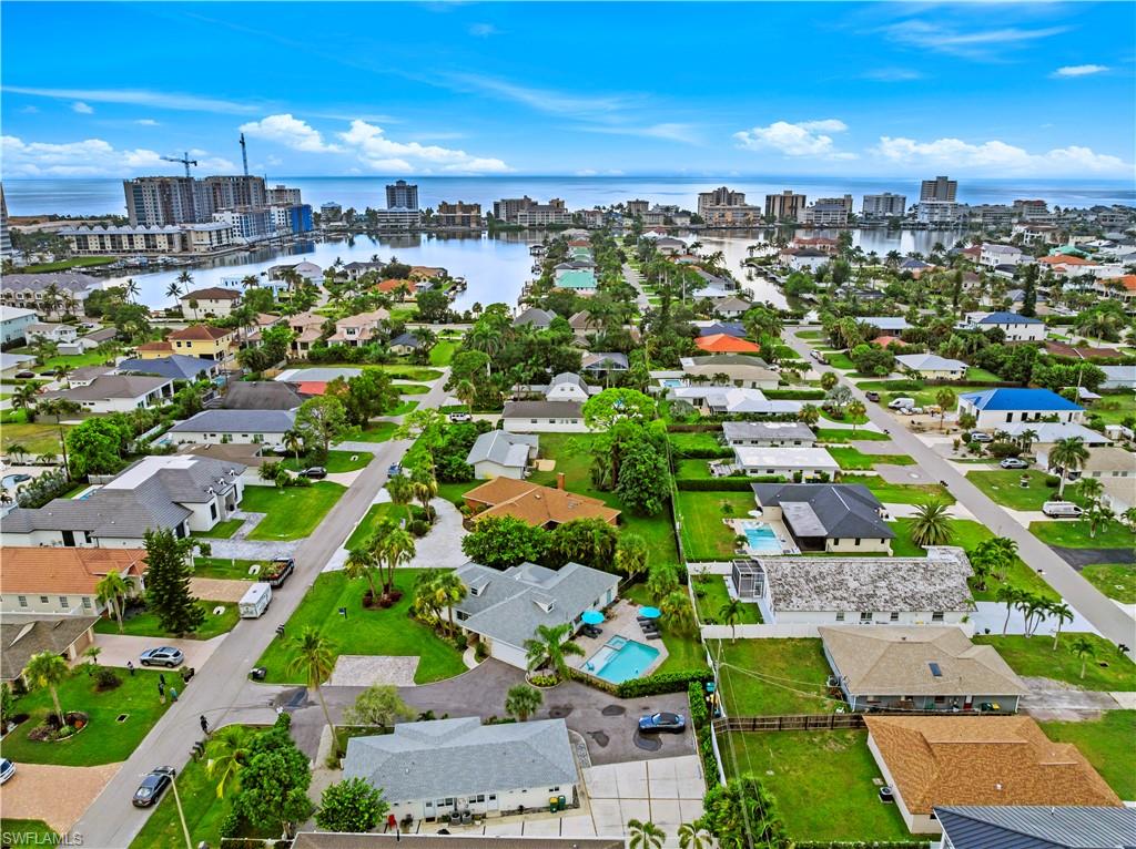 541 94th Avenue North Naples, FL 34108 - Photo 18 of 21 an aerial view of a city