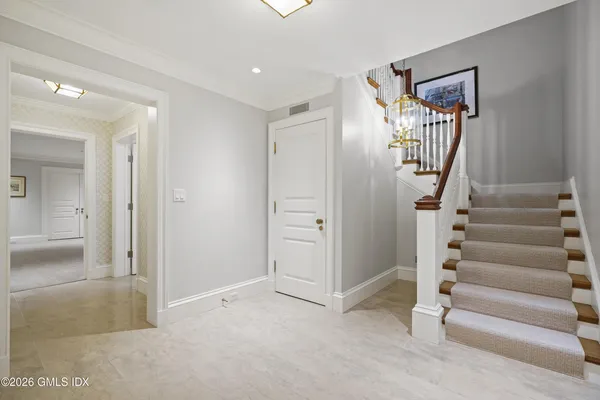 a view of entryway with livingroom