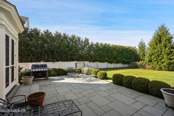 a view of swimming pool with patio