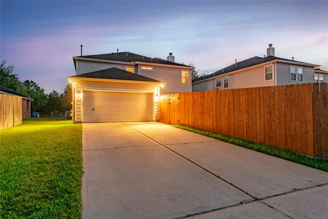a front view of a house with yard
