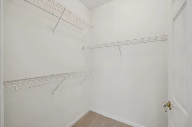 a view of a room with racks on the wall