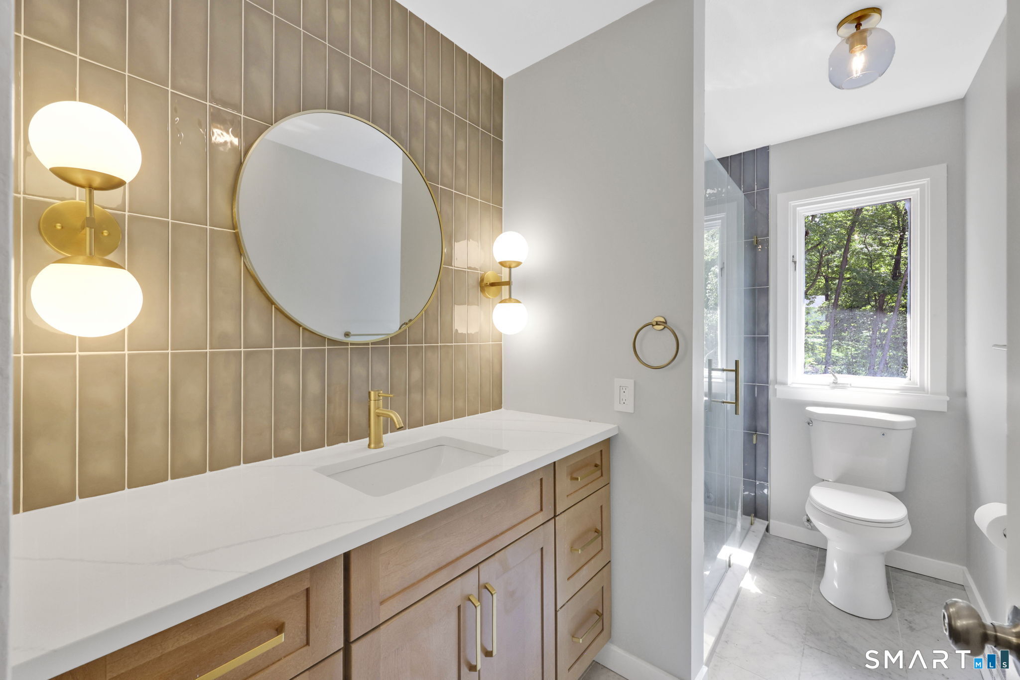 49 Millstone Road Glastonbury, CT 06033 - Photo 15 of 39 a bathroom with a sink and a mirror
