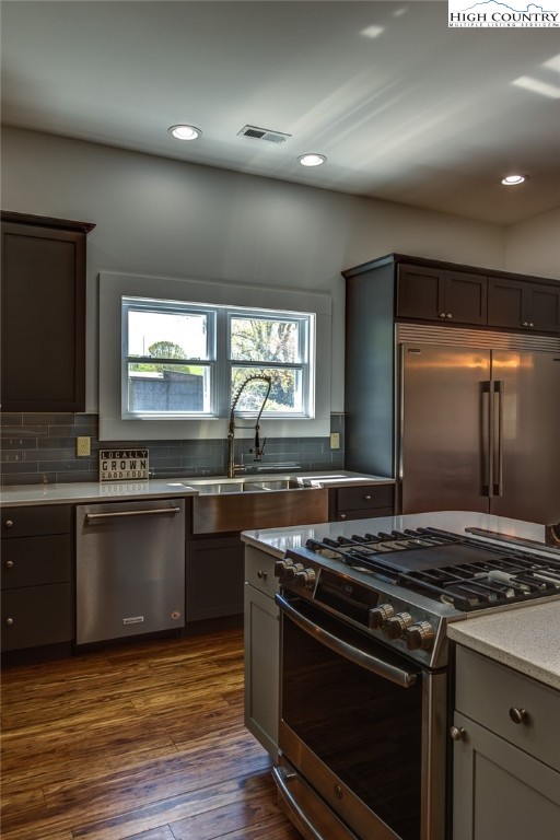 2388 Carsonville Road Independence, VA 24348 - Photo 12 of 50 a kitchen with stainless steel appliances granite countertop a stove and a sink