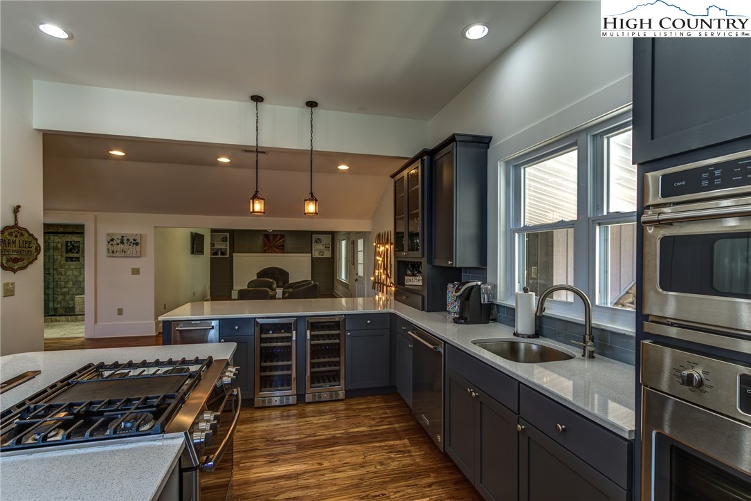 2388 Carsonville Road Independence, VA 24348 - Photo 18 of 50 a kitchen with sink stove and cabinets