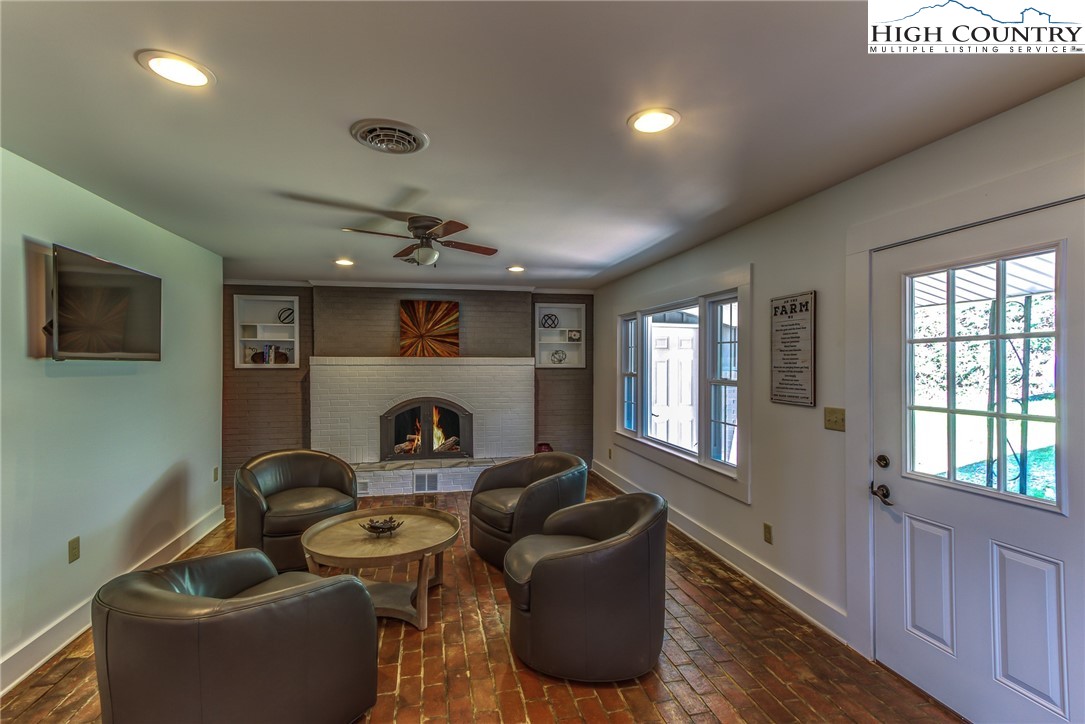 2388 Carsonville Road Independence, VA 24348 - Photo 20 of 50 a living room with furniture and a fireplace
